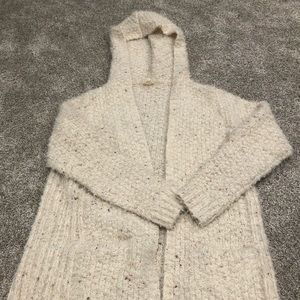 Hem and thread sweater